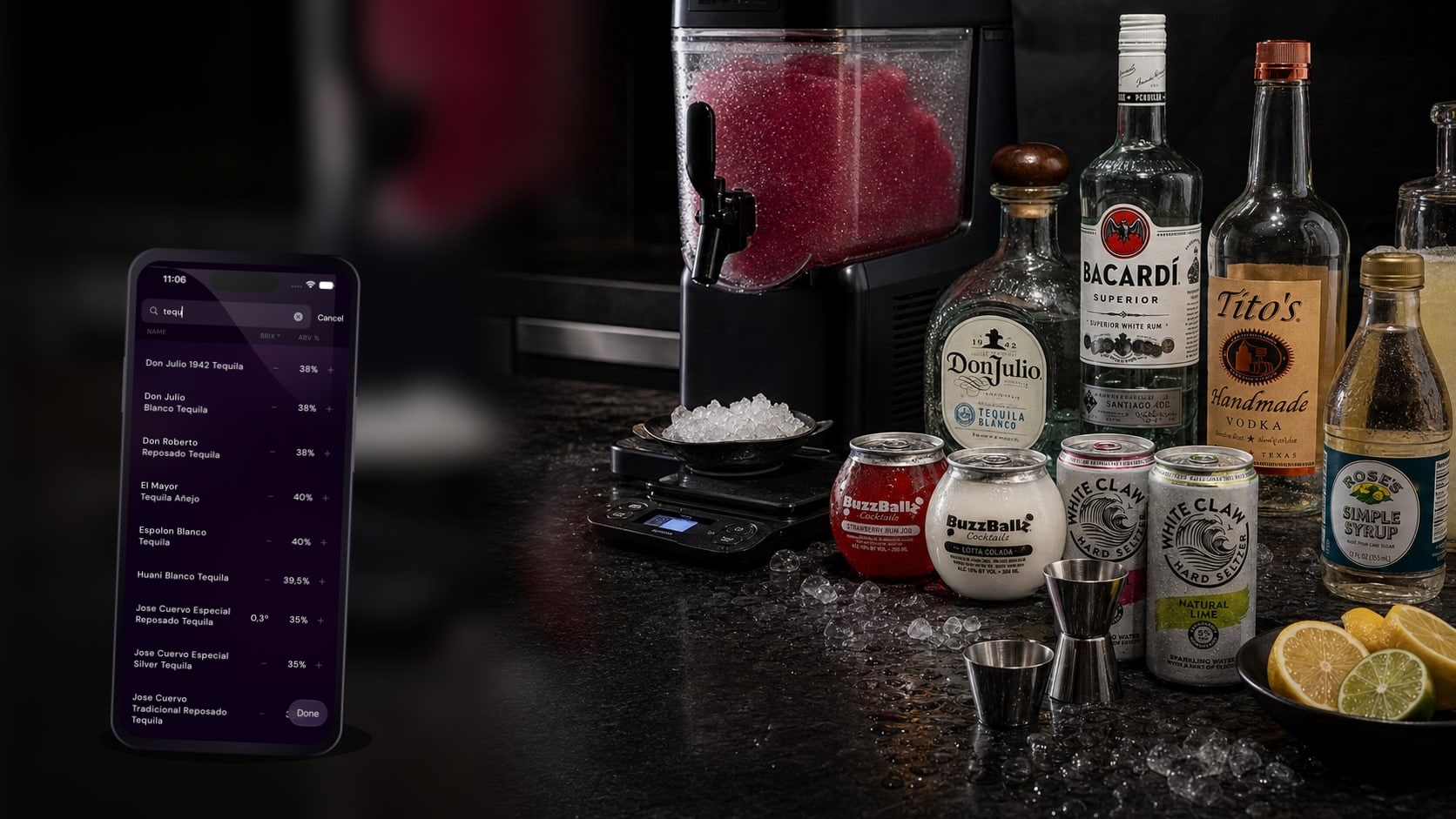 An iPhone showing Slushable ingredient search placed on a dark bar counter beside a Ninja SLUSHi machine, White Claw cans, BuzzBallz cocktails, branded spirits, syrup, citrus, a scale, and jiggers.